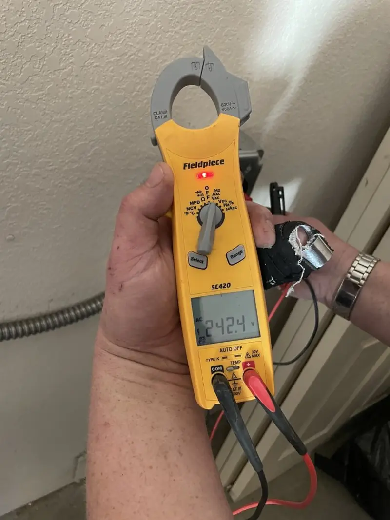 Voltage testing with clamp meter during Circuit Breaker Repair in Northgate